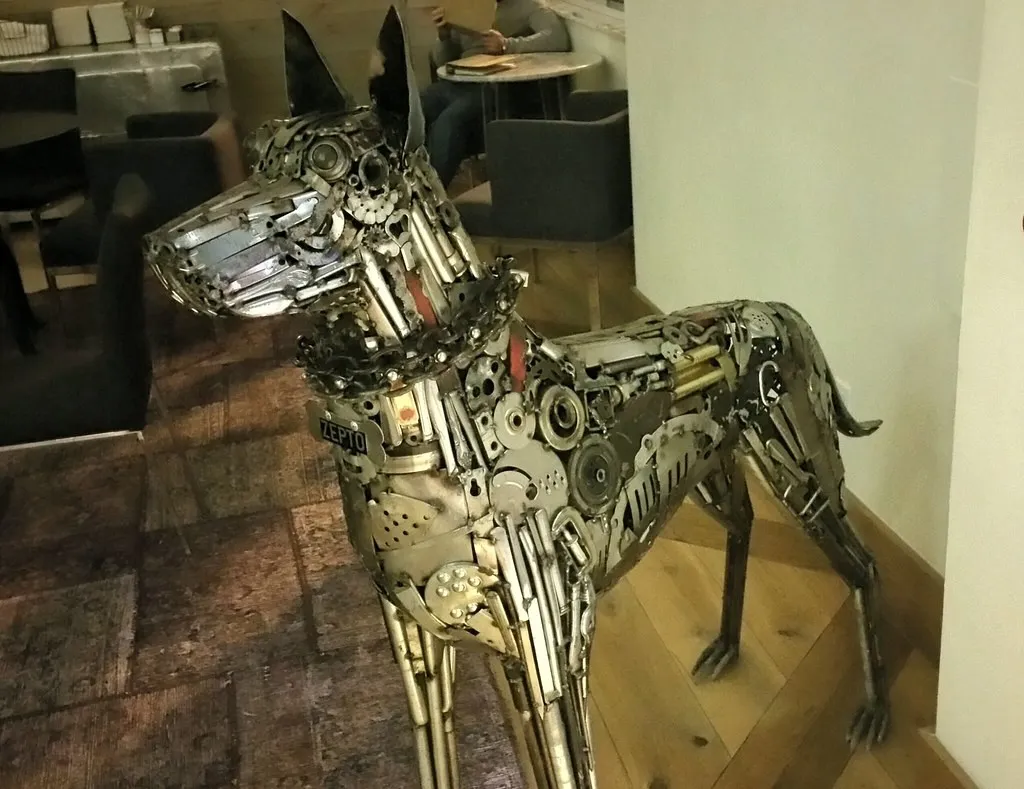 Zepto’s metal dog logo (Flickr via Openverse, by 2.0, credit: archieflickers)