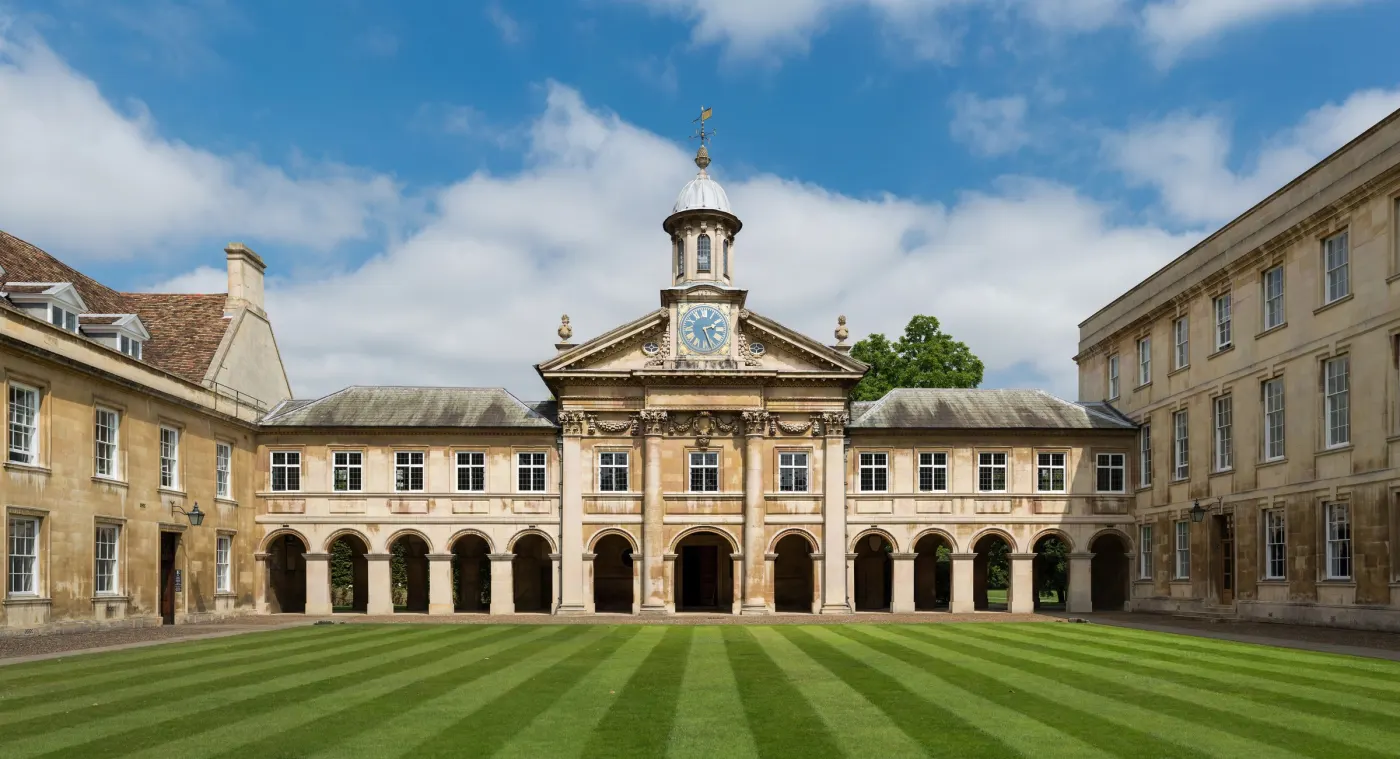 Emmanuel College front court with its striped lawn and colonnade