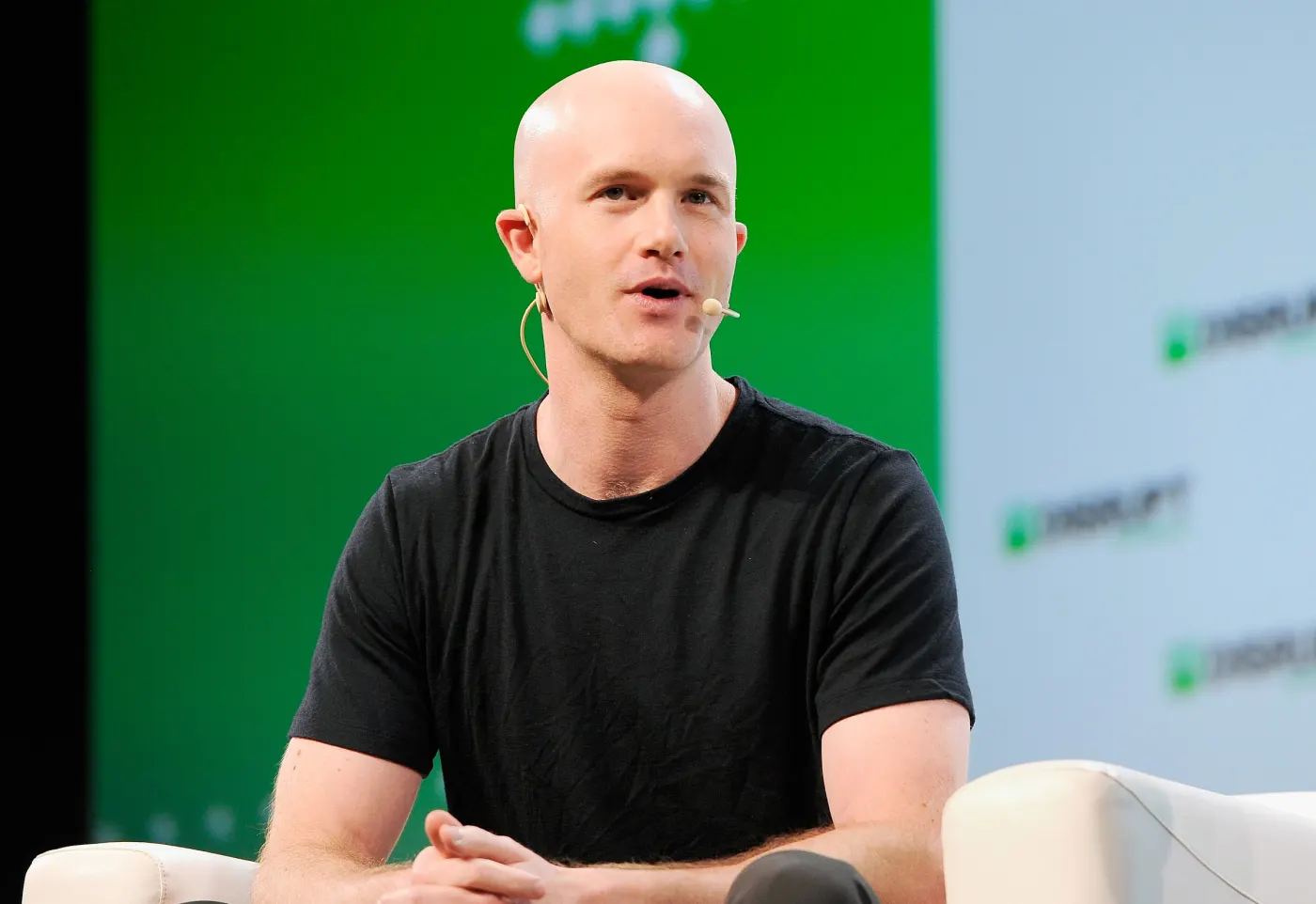 Armstrong speaking at TechCrunch Disrupt