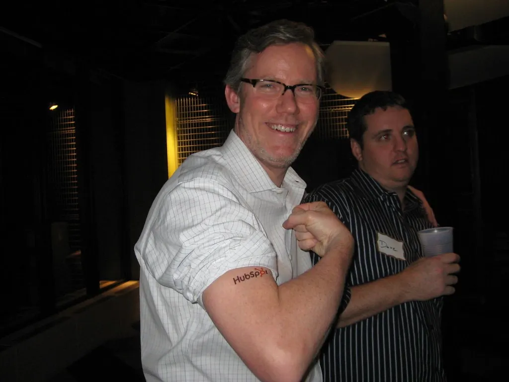 Brian Halligan showing his HubSpot tattoo at the 1K Celebration (Flickr via Openverse, by-nc-sa 2.0, credit: HubSpot)