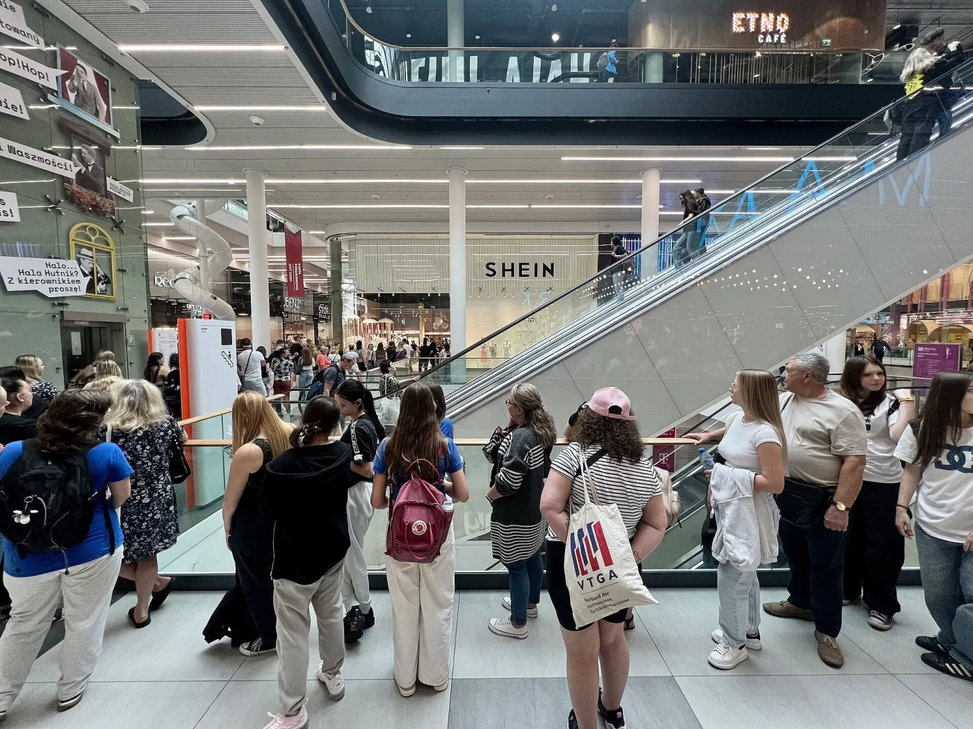 Shoppers queue outside a SHEIN store in Warsaw (Wikimedia Commons, credit needed)