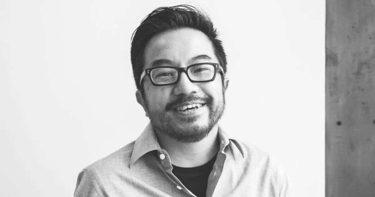 Close black-and-white smiling headshot of Garry Tan