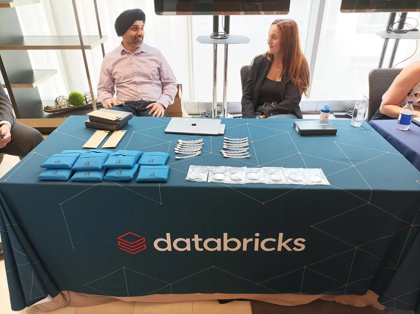 A Databricks booth at a tech event (Wikimedia Commons, credit needed)