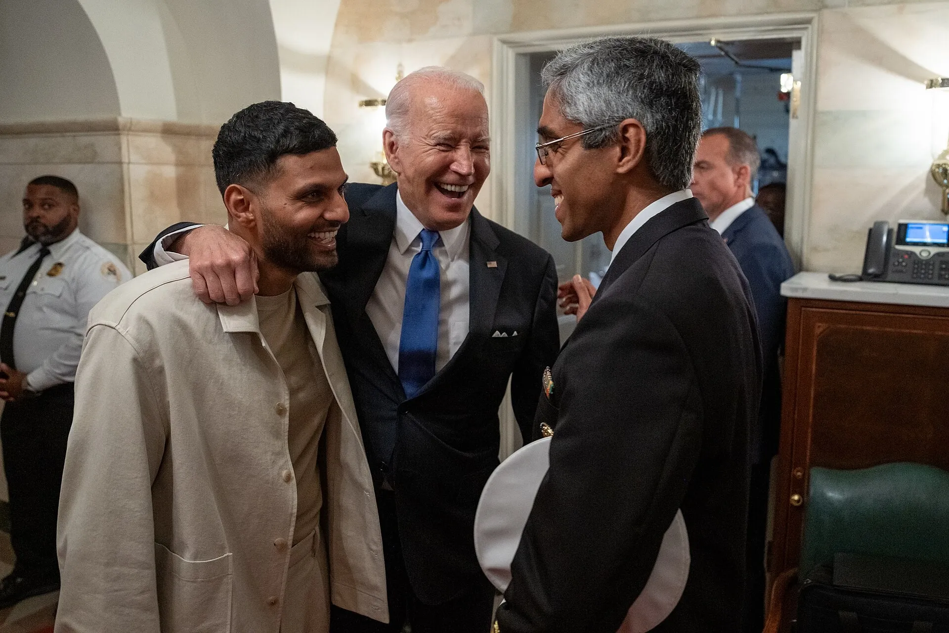 Joe Biden signs a guest book for Jay Shetty (Wikimedia Commons, see Commons page, credit: creator)