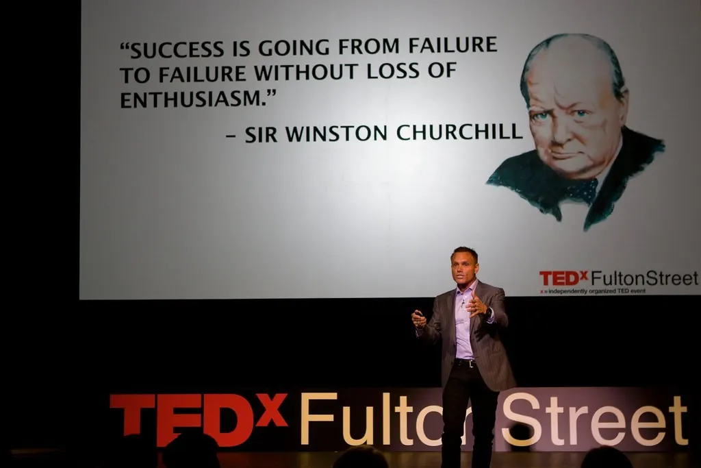 Kevin Harrington on stage at TEDxFultonStreet (photo #166186). (Flickr via Openverse, by‑nc‑nd 2.0, credit: tedxfultonstreet)