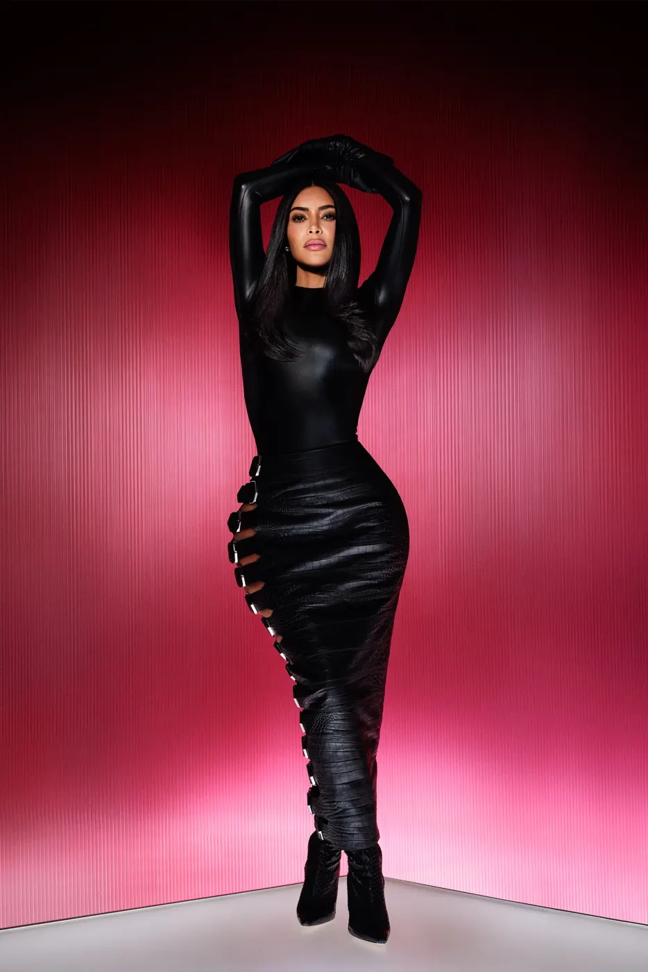 Magenta studio full-body SKIMS-era fashion portrait