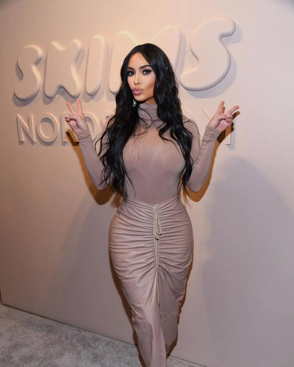 Kim at a public event in polished glam