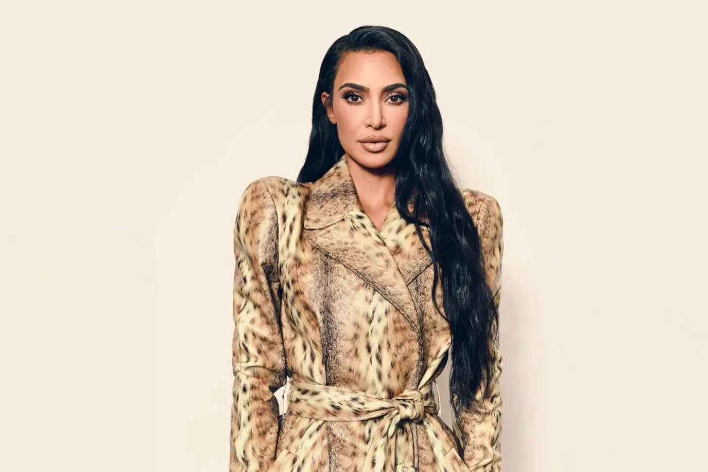 Animal-print trench studio portrait