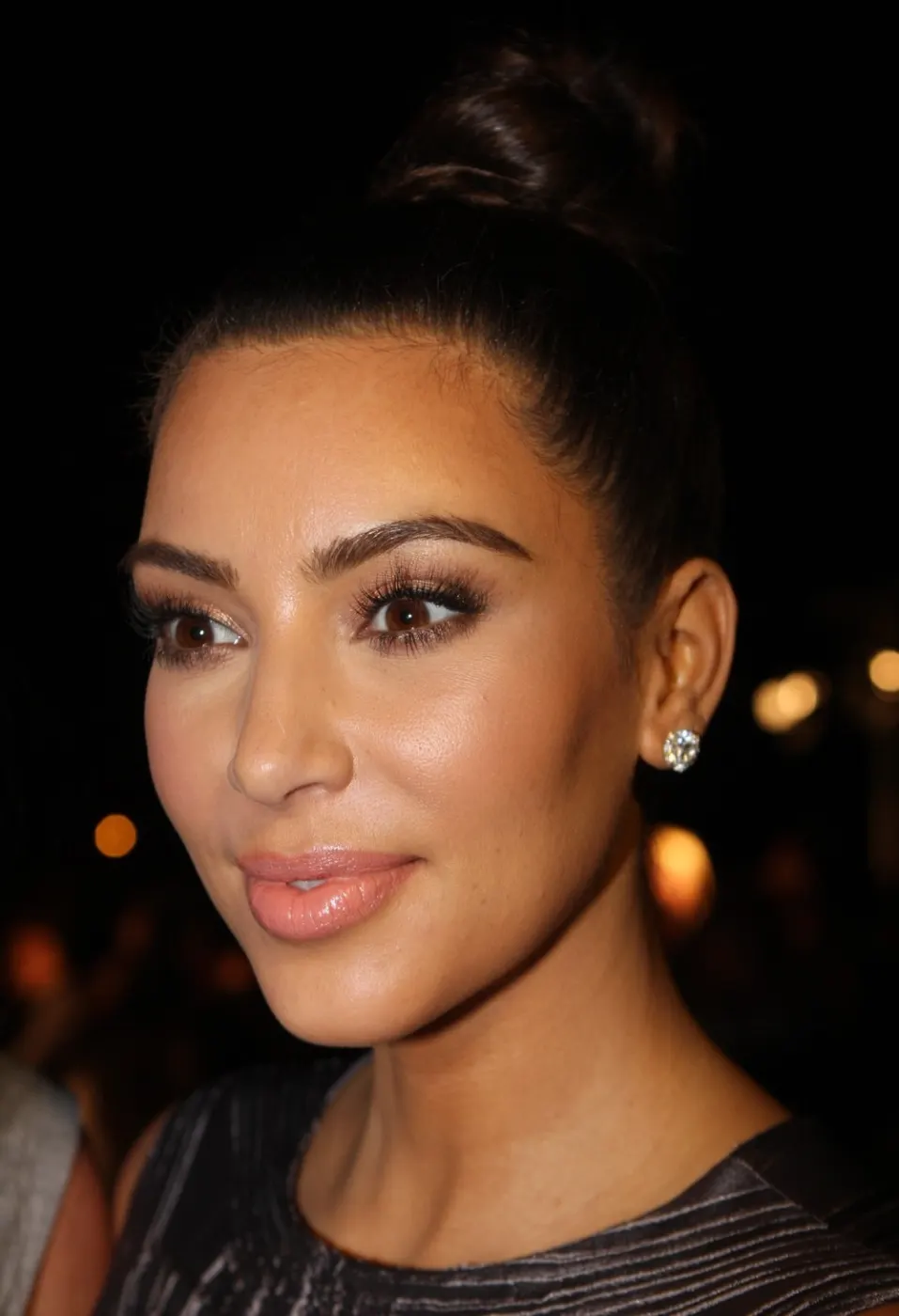 Night glam portrait, high bun, diamond stud