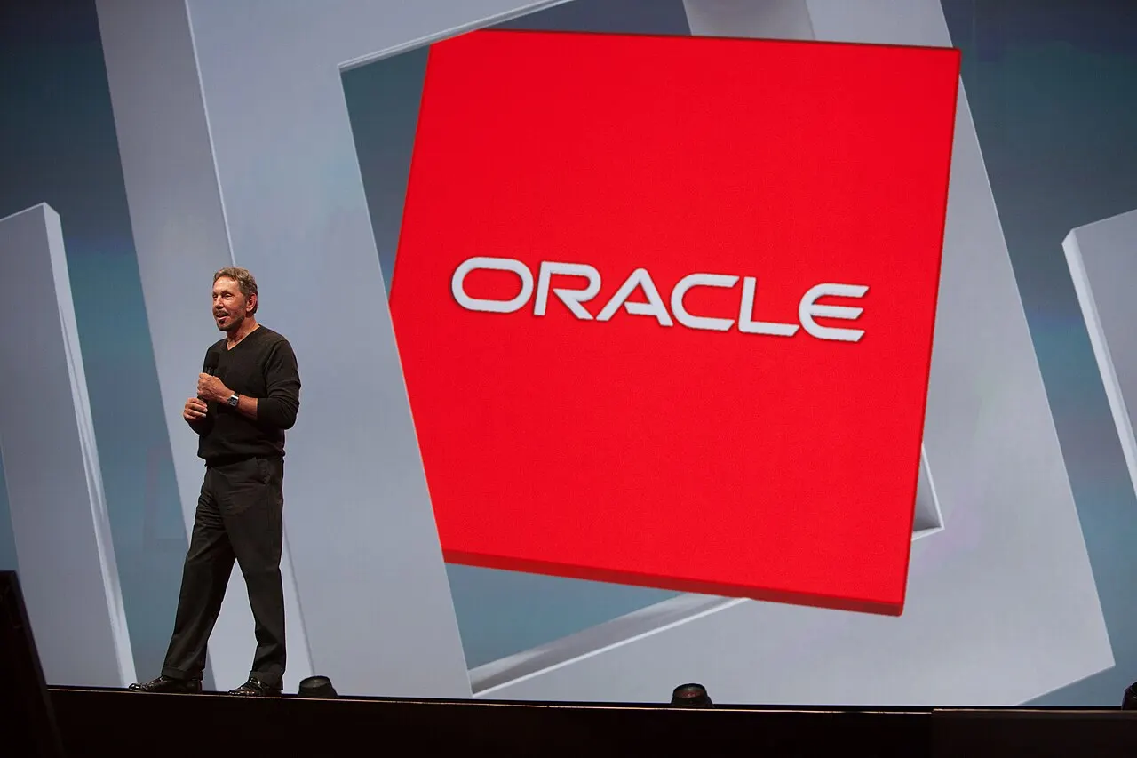 Larry Ellison on stage at conference