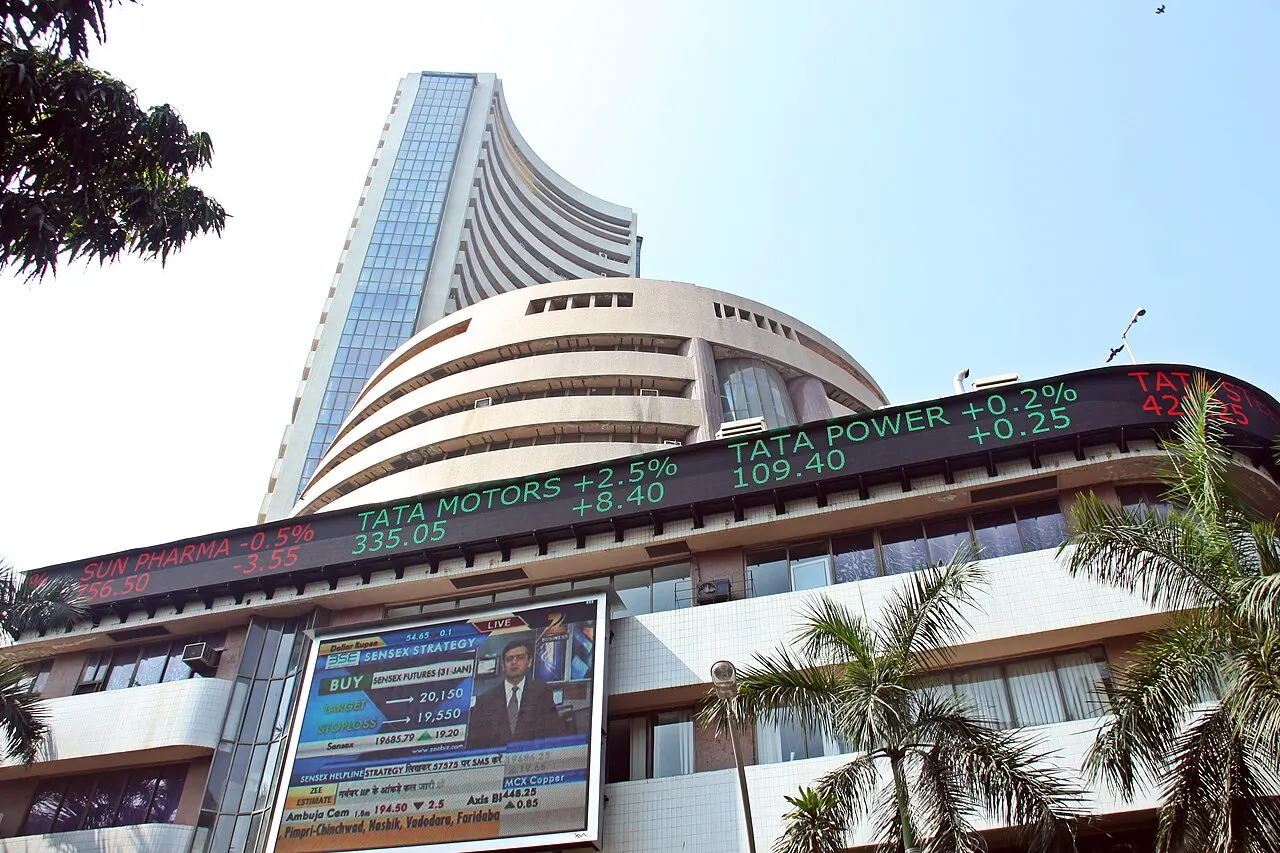 BSE towers with live Sensex strategy screen and equity tickers