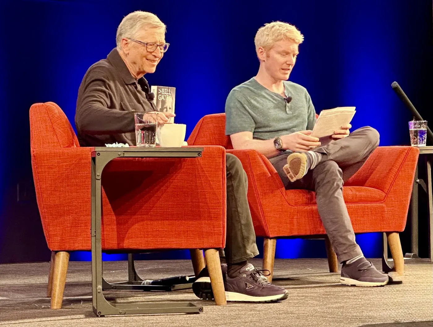 Patrick Collison on stage with Bill Gates