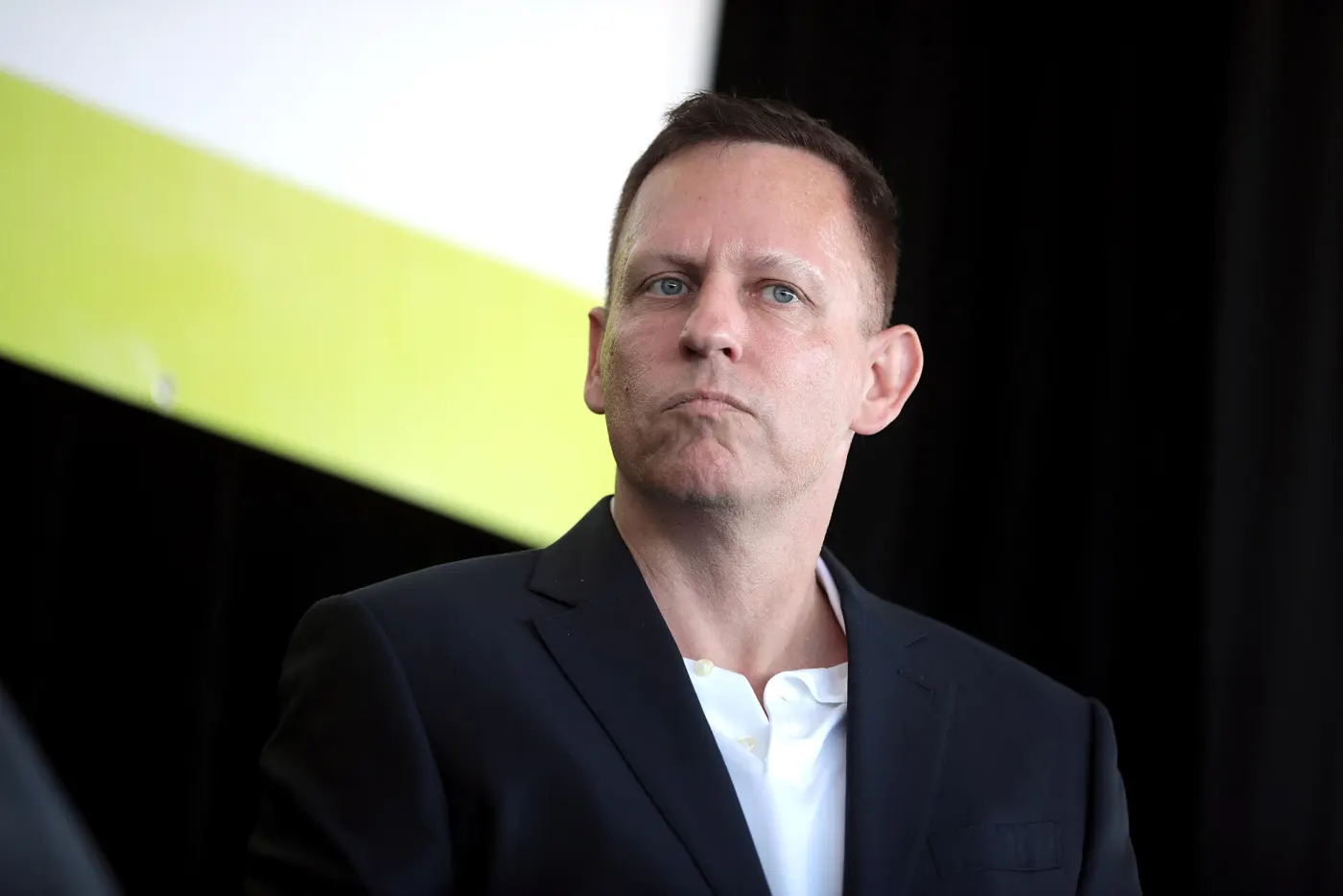 Close portrait of Peter Thiel on stage