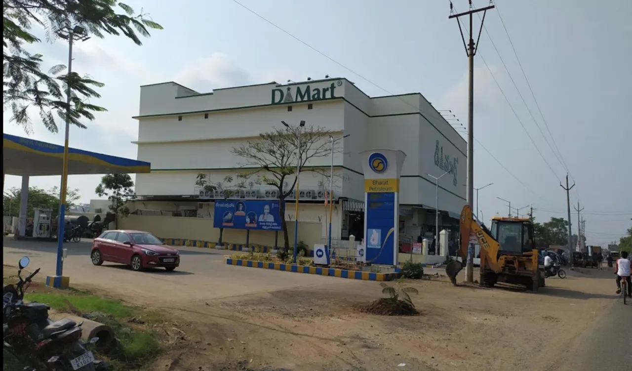 Multi-story DMart beside a Bharat Petroleum station in Andhra Pradesh