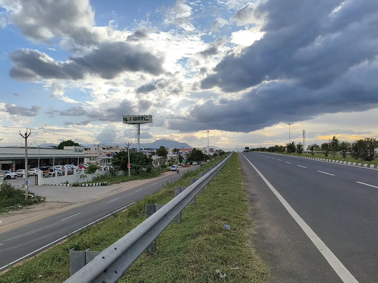 Elevated view of a DMart beside a Tamil Nadu highway