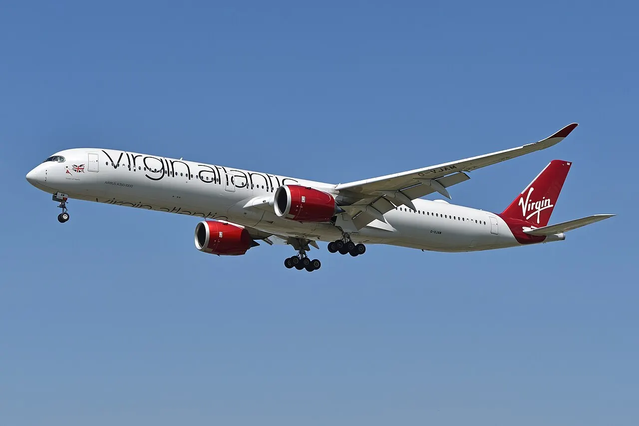 Virgin Atlantic Airbus A350-1000 in flight with red engines and tail