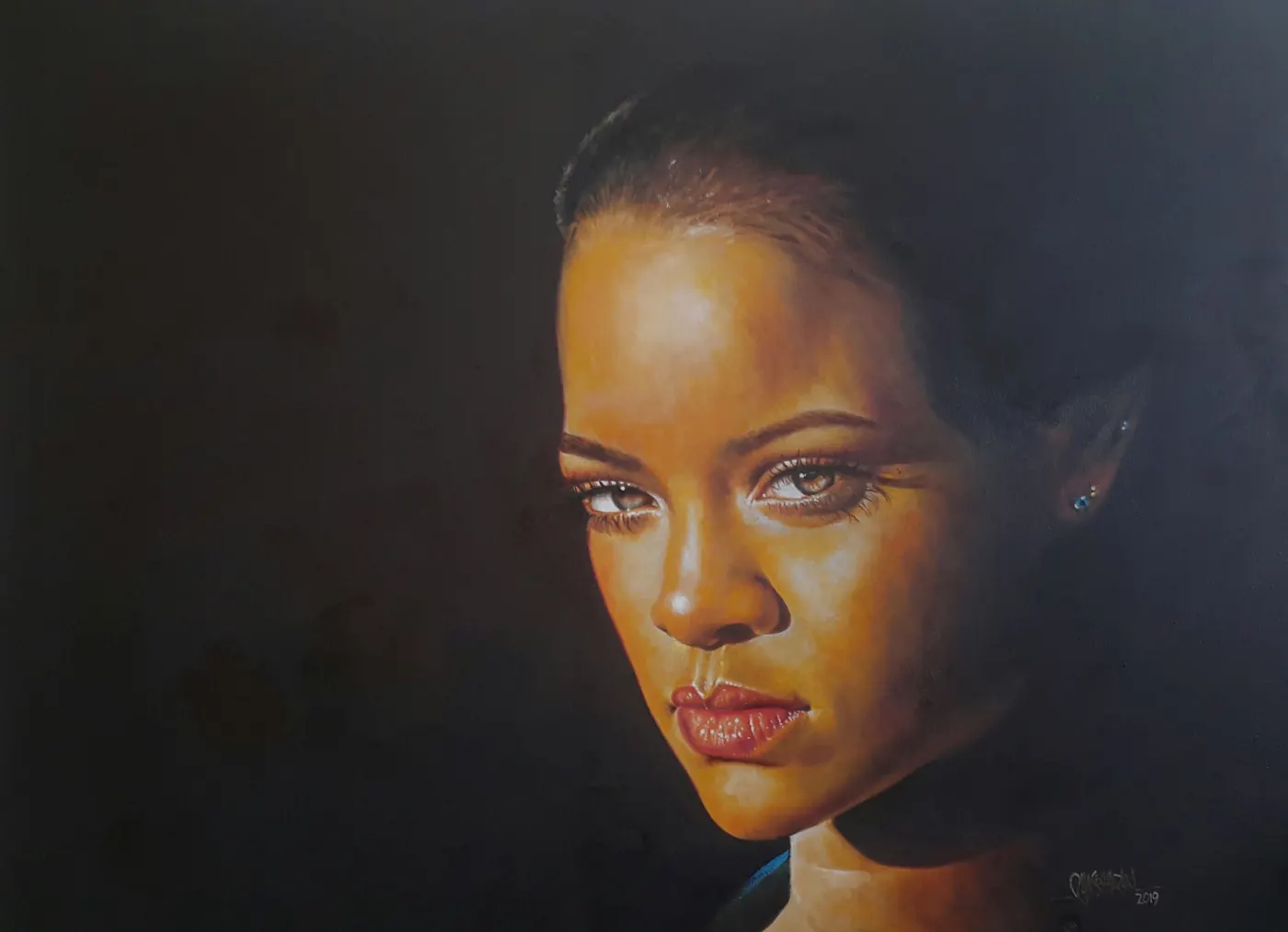 Warm-lit dramatic close portrait, hair pulled back