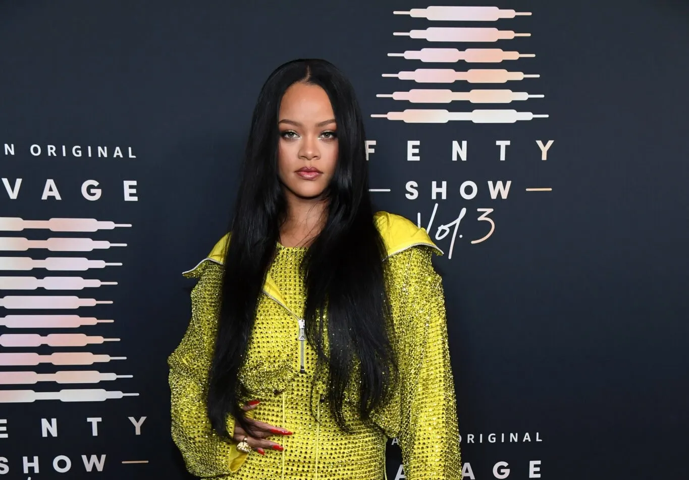 Yellow dress at Savage X Fenty Show Vol. 3 backdrop