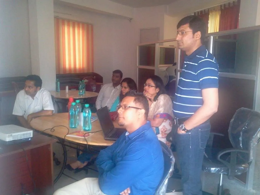 Meeting room with founders and a projector, early collaboration texture