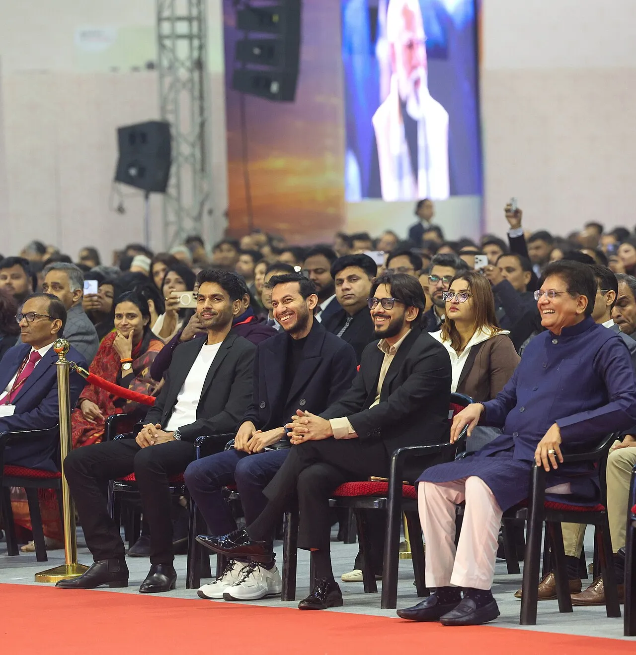Ritesh Malik in front row at a large India business event