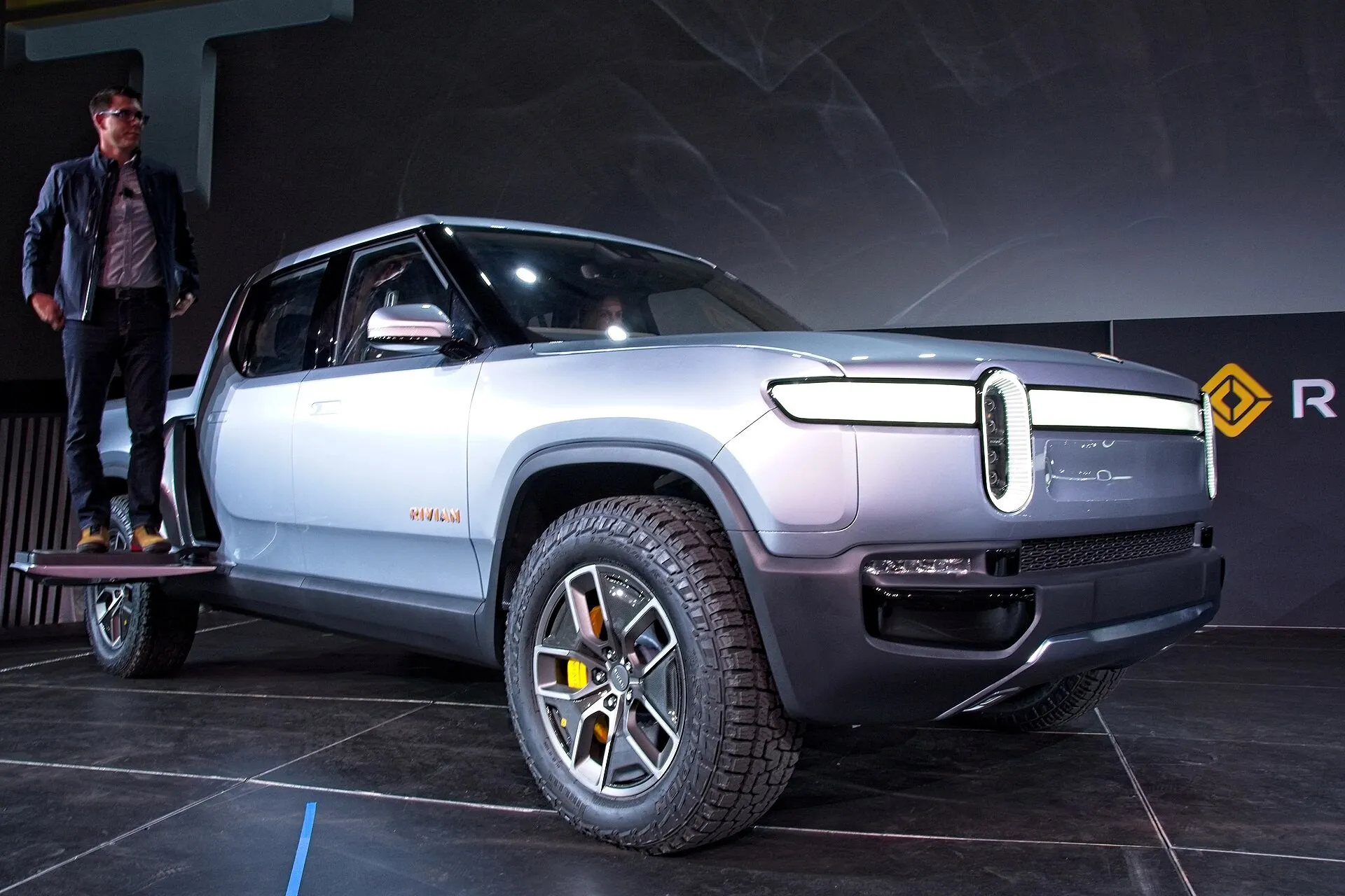 RJ Scaringe at the debut of the Rivian R1T pickup, Los Angeles Auto Show, 2018 (Wikimedia Commons, credit needed)