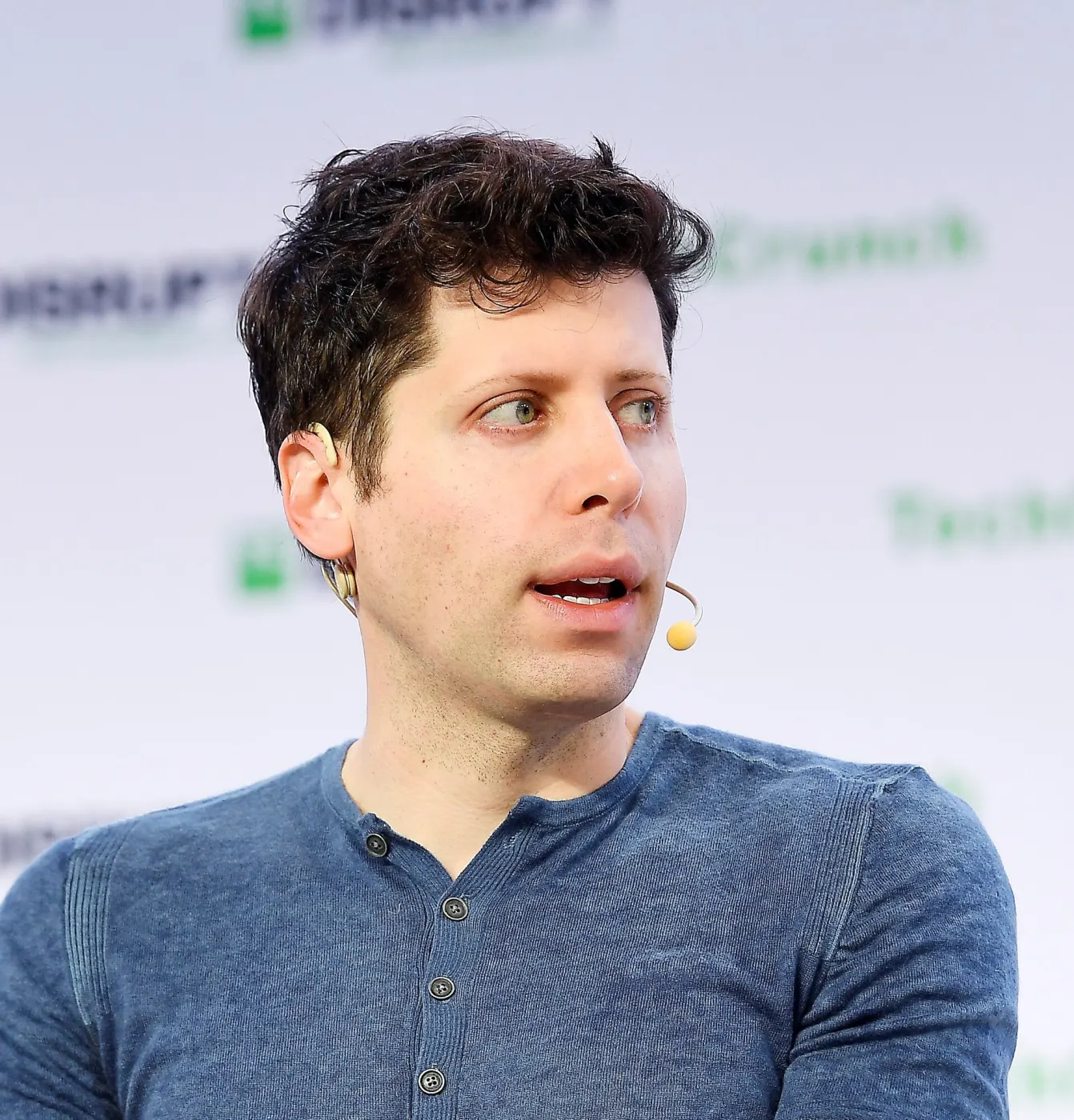 Sam Altman headset portrait